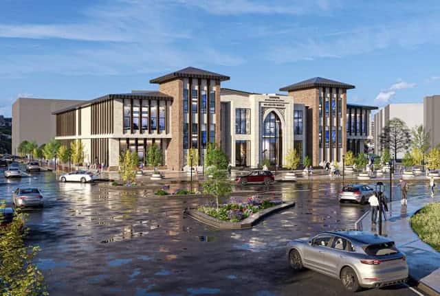 Basin Merkezi binası, modern tasarım ve geniş alanlarıyla dikkat çekiyor, bölgenin önemli ticaret merkezi.